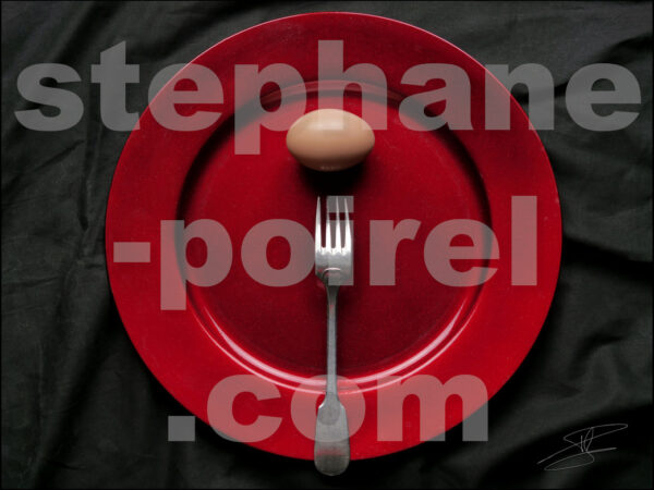 Œuf dans une assiette